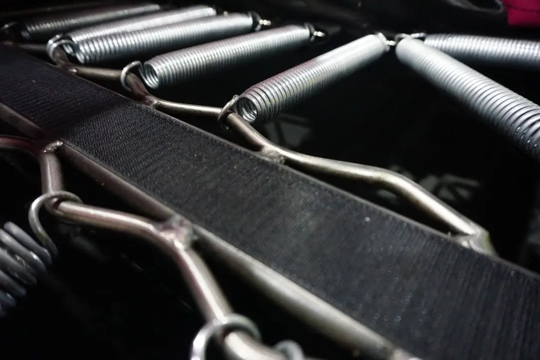 Inspector reviewing trampoline park equipment to ensure compliance with safety standards.